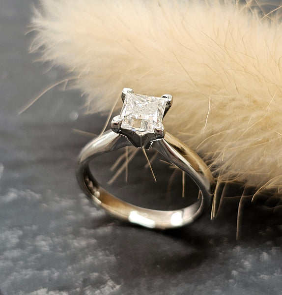 High set princess cut diamond solitaire ring