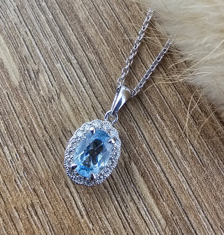 Vintage aquamarine halo pendant