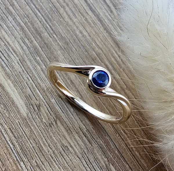 Sapphire crossover ring