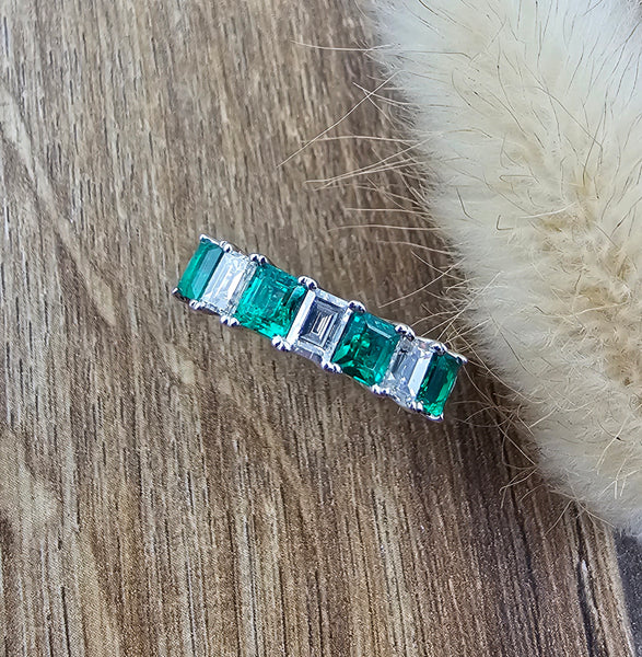 Octagonal emerald and diamond seven stone ring