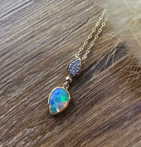 Teardrop opal and diamond pendant
