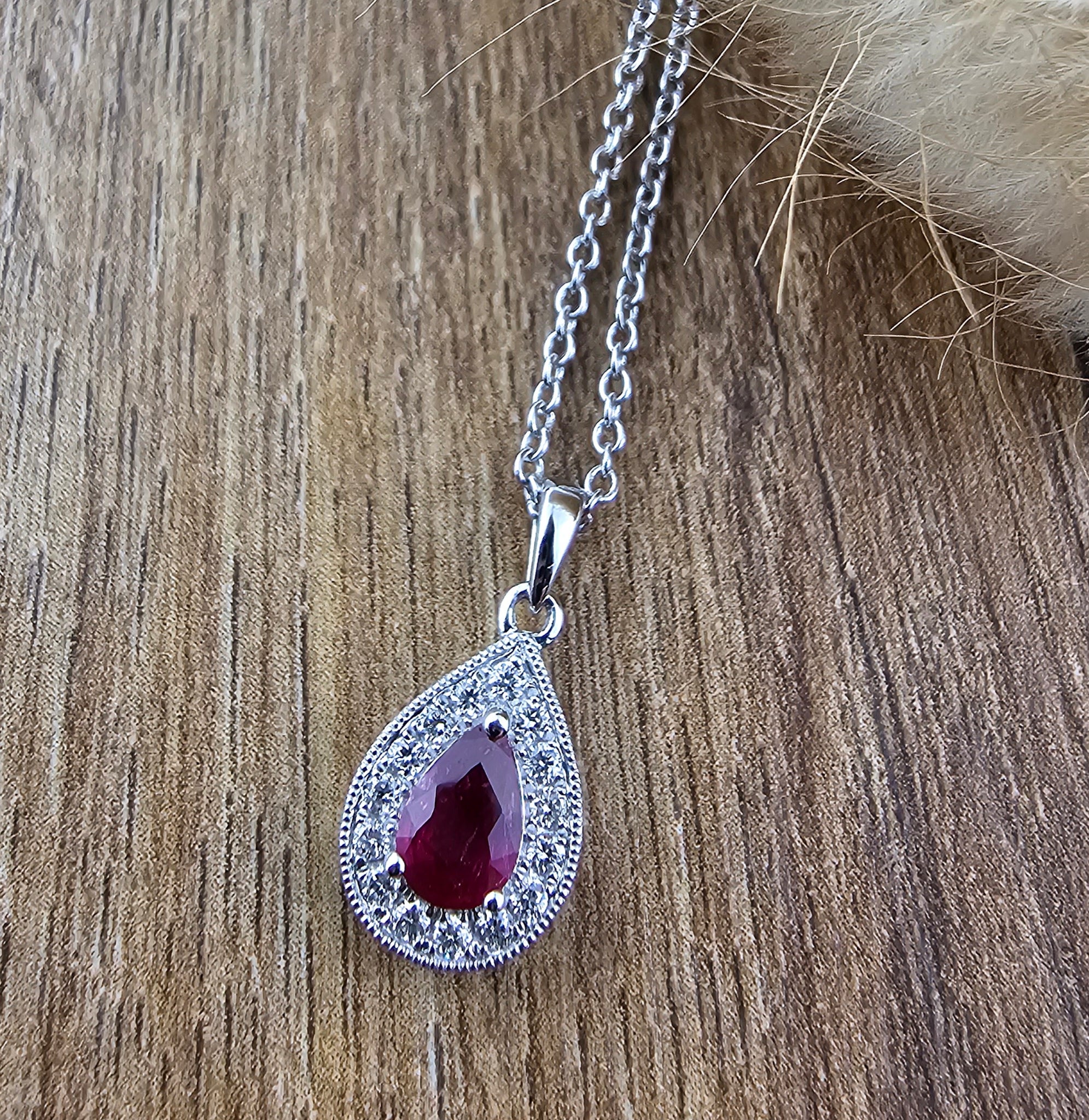 Vintage style ruby halo pendant