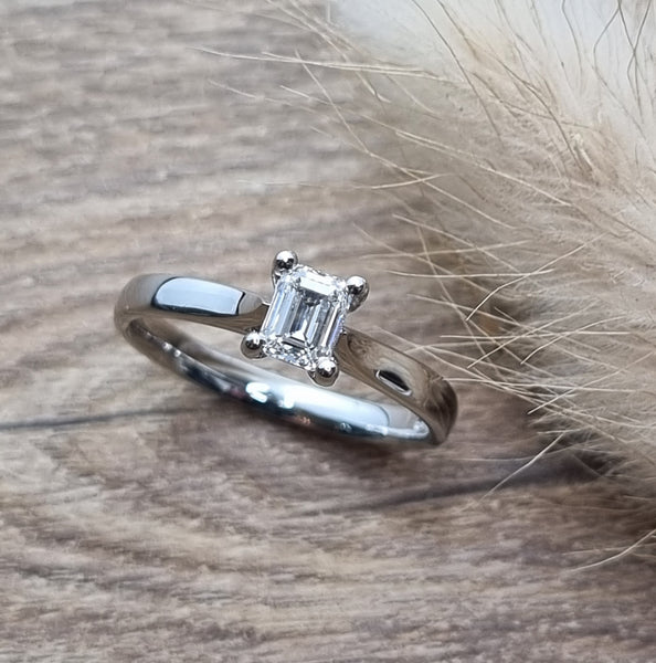 Emerald cut diamond solitaire ring