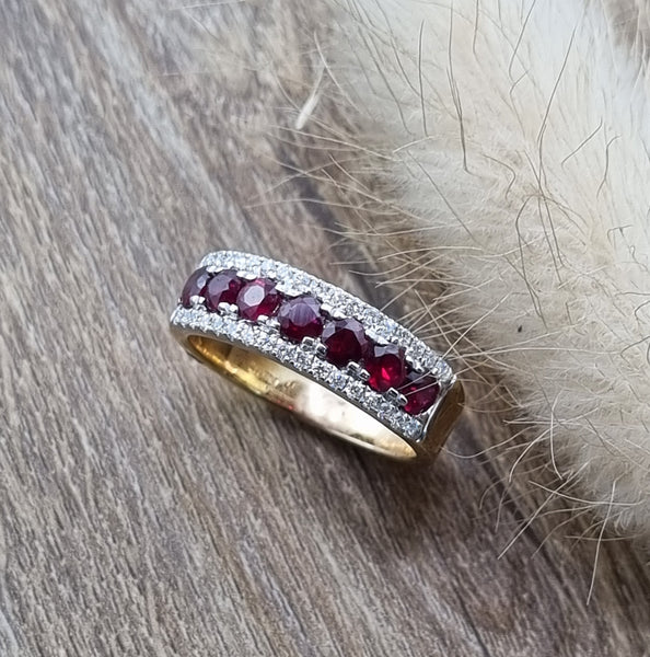 Ruby and diamond claw set dress ring