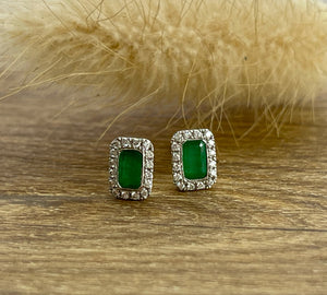 Emerald cut emerald halo stud earrings