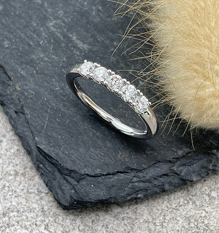 Five stone diamond eternity ring