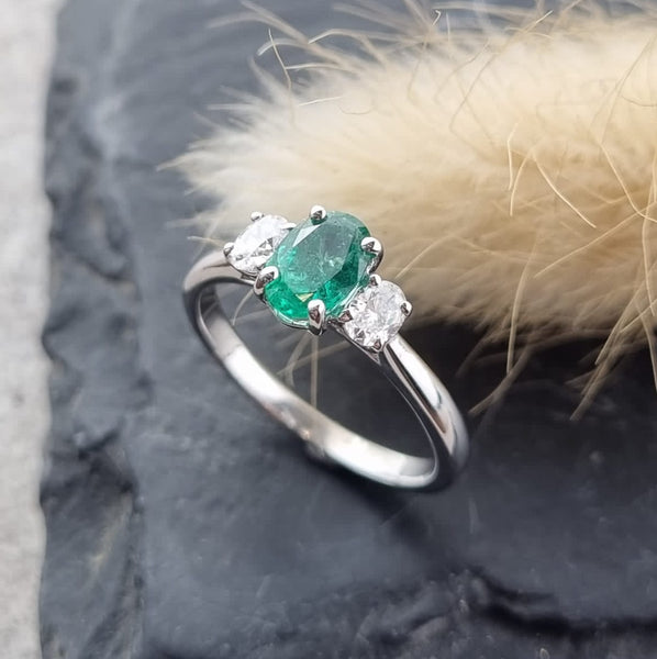 Oval emerald and diamond trilogy ring