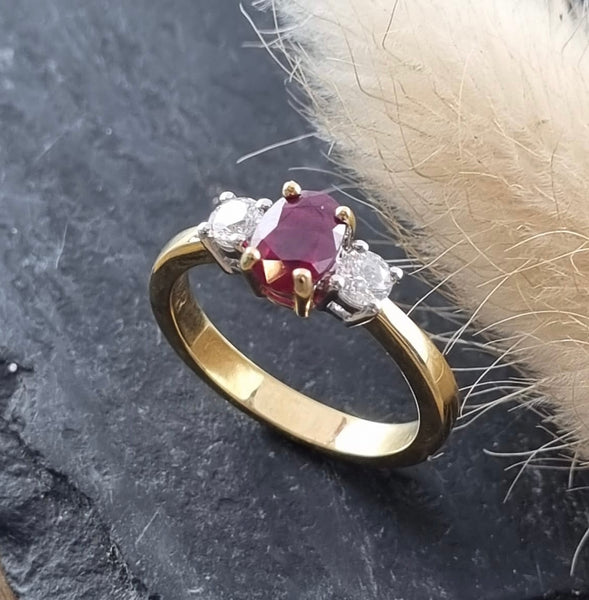 Traditional ruby and diamond three stone ring