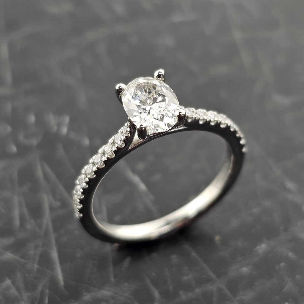 Oval Solitaire with Diamond Shoulders