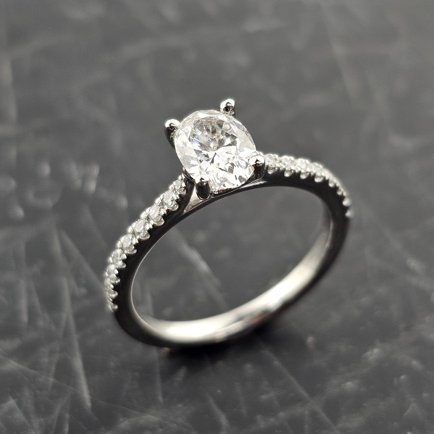 Oval Solitaire with Diamond Shoulders