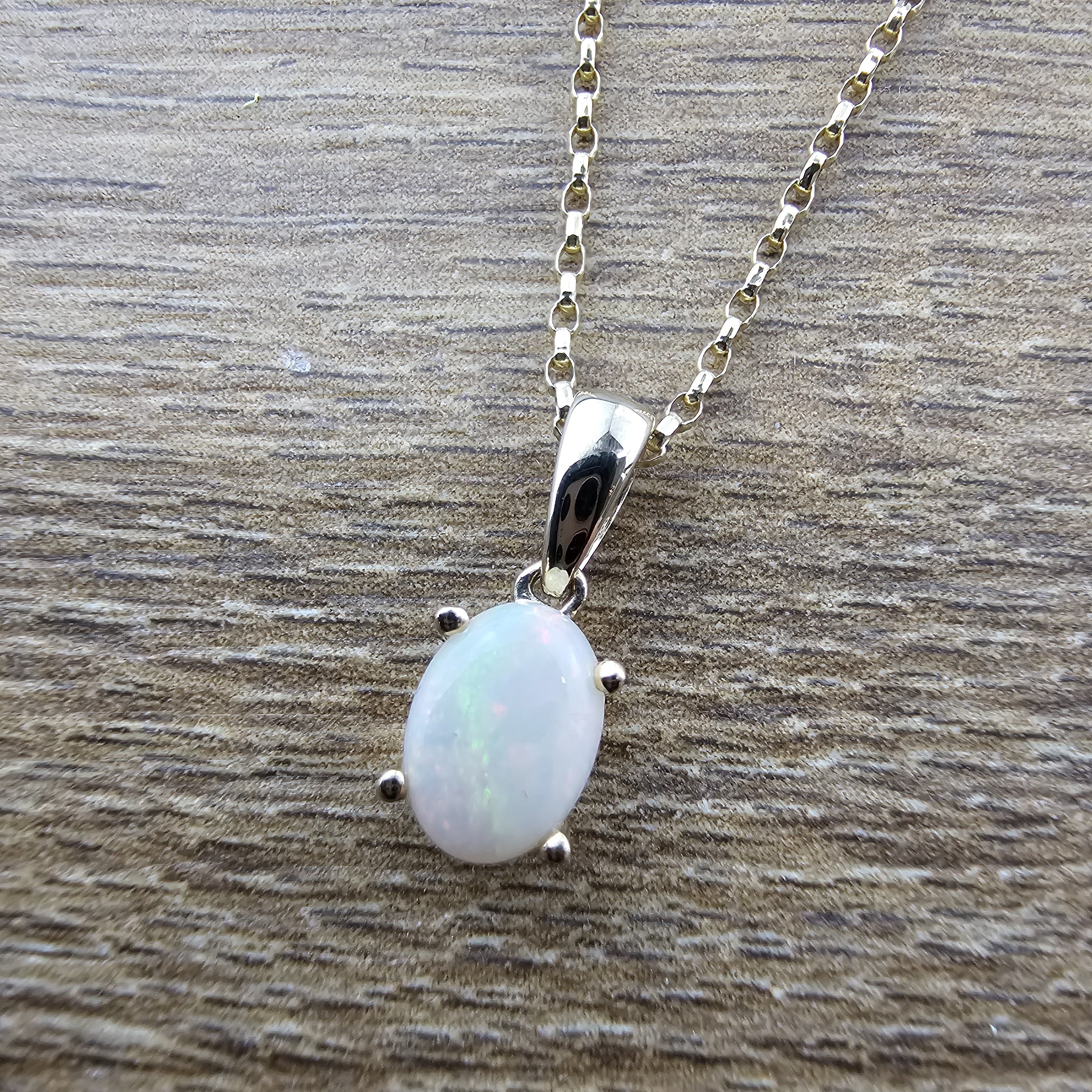 Oval Opal Claw Set Pendant