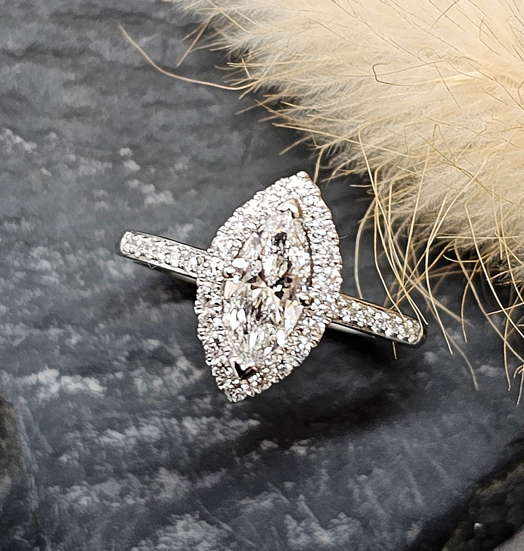 Marquise halo engagement ring