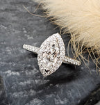 Marquise halo engagement ring