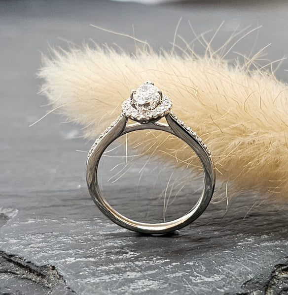 Marquise diamond halo ring