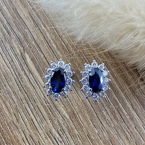 Oval sapphire traditional cluster earrings
