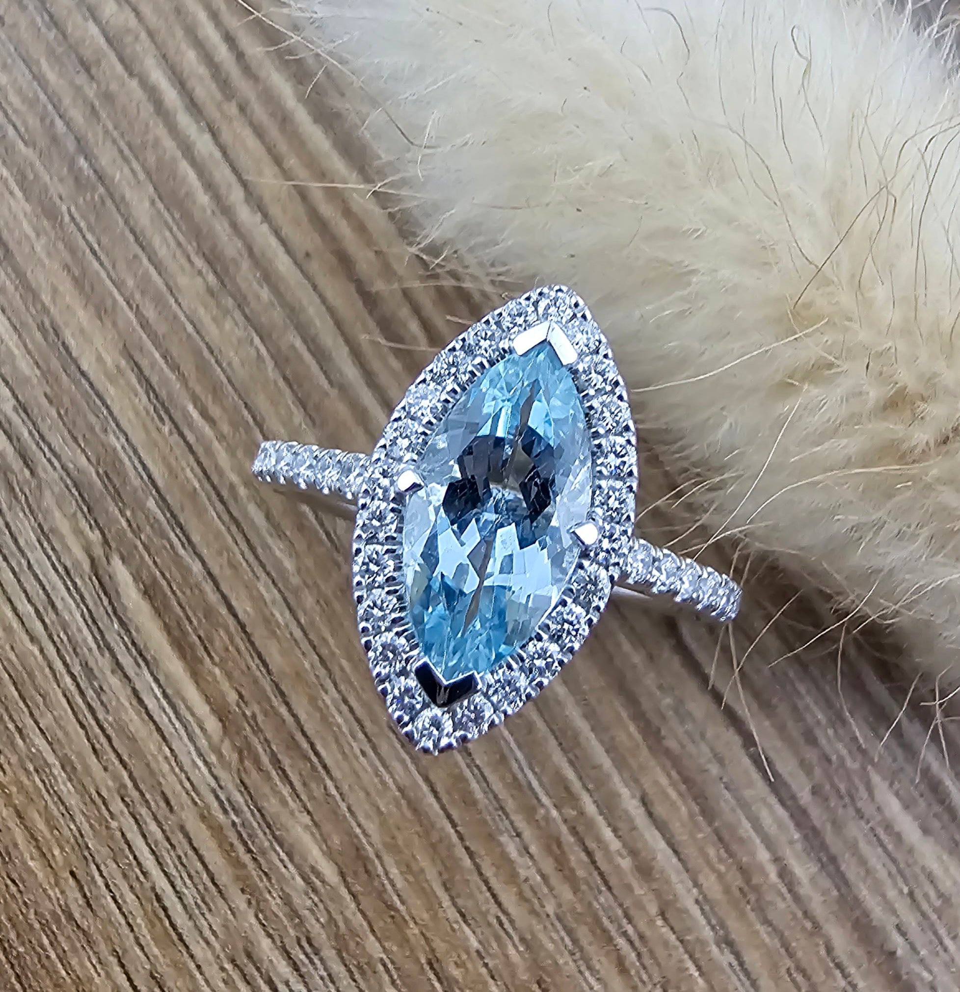 Aquamarine marquise cut halo ring