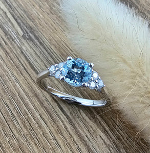 Aquamarine and diamond trefoil ring