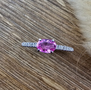 Oval pink sapphire solitaire