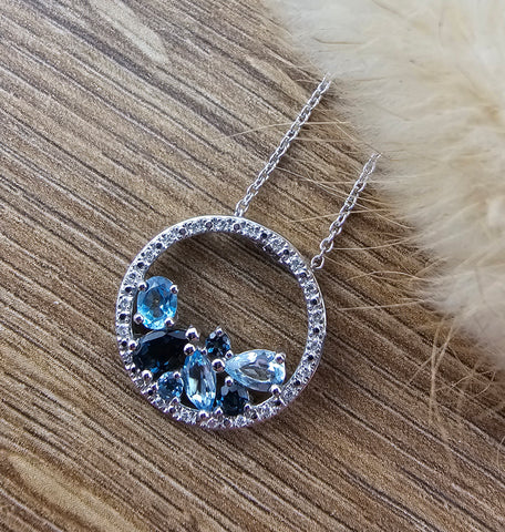 Blue topaz open circle pendant