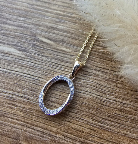 Diamond set oval pendant