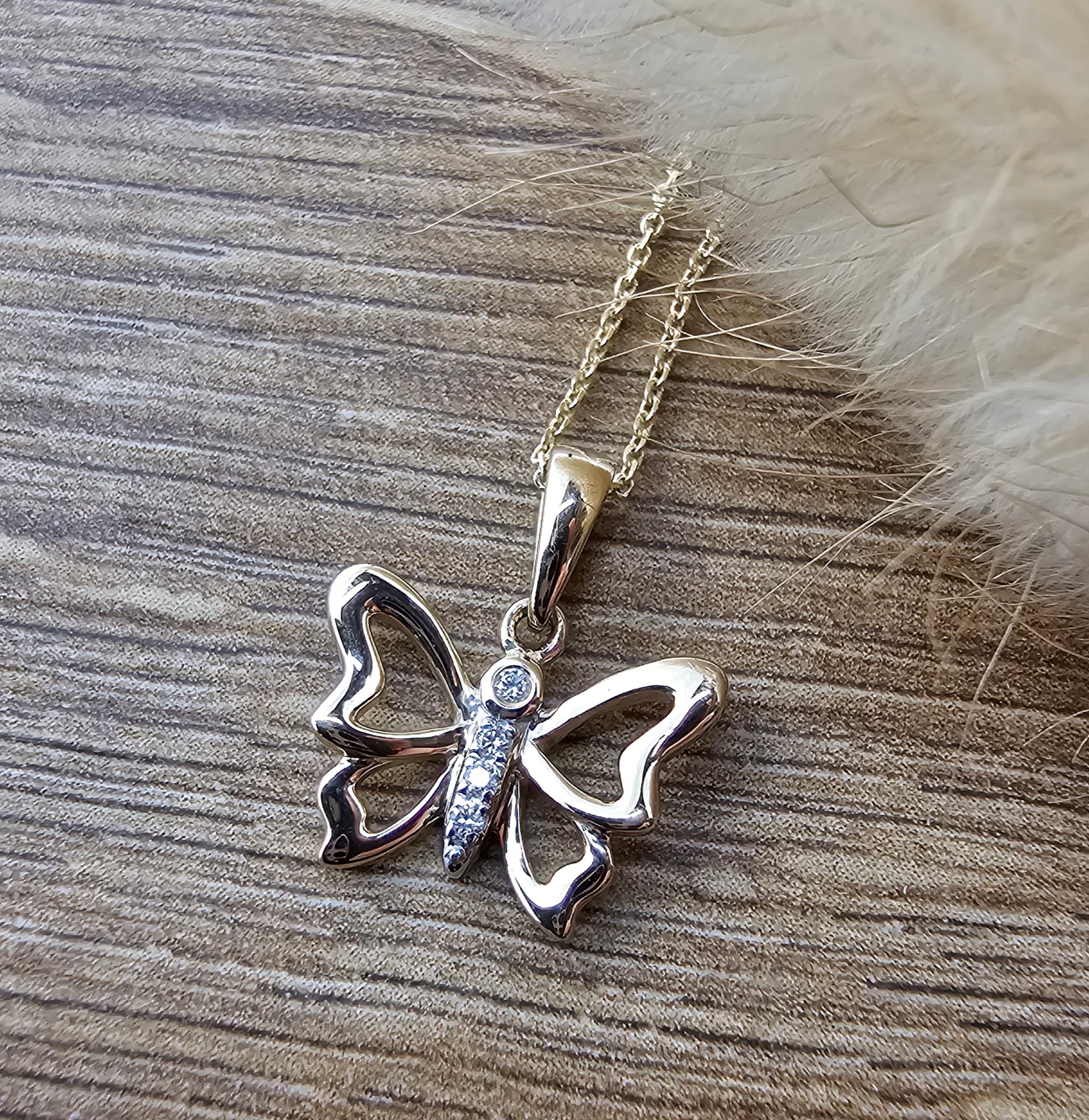 Diamond set butterfly pendant