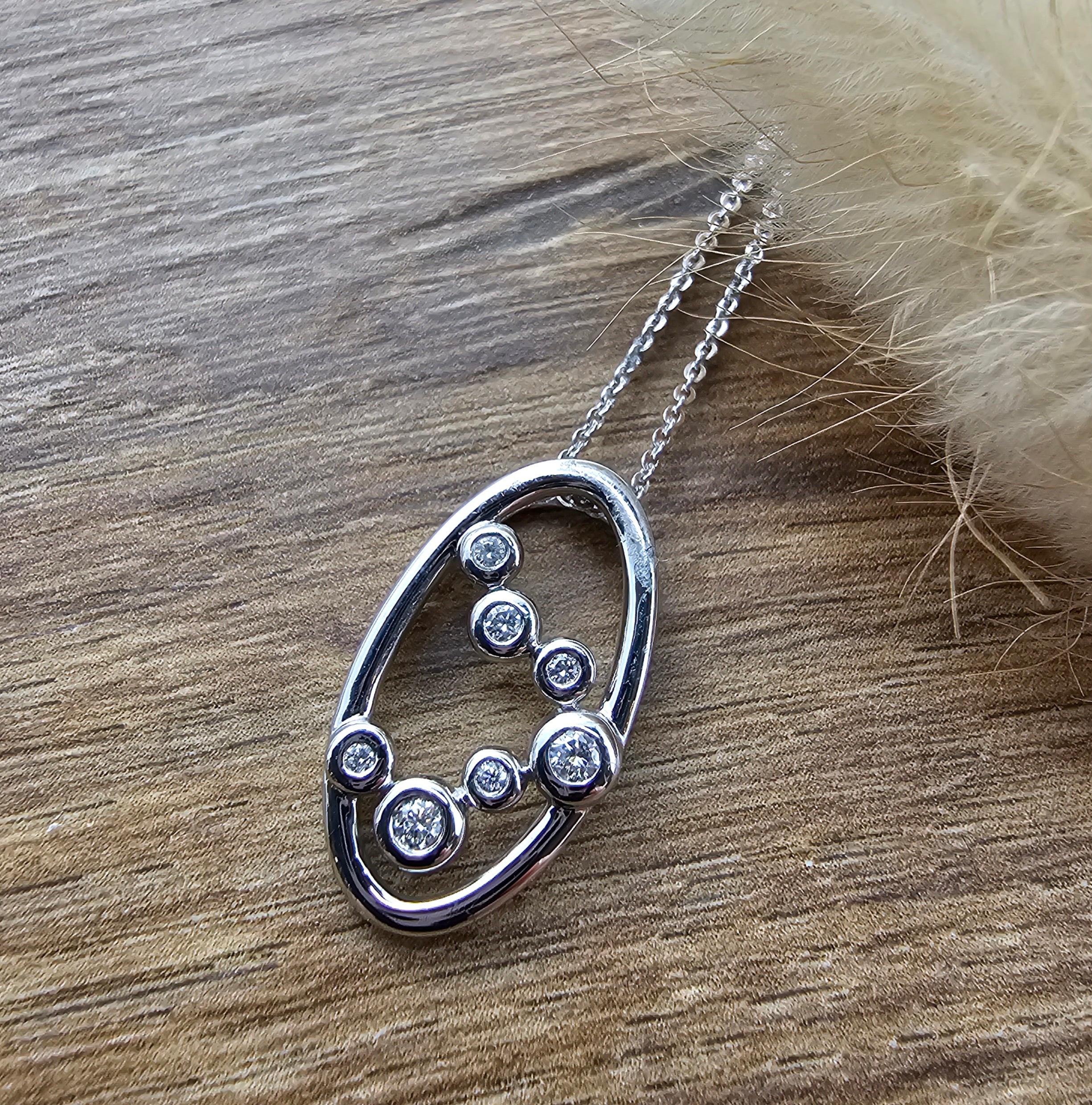 Oval bubble diamond pendant