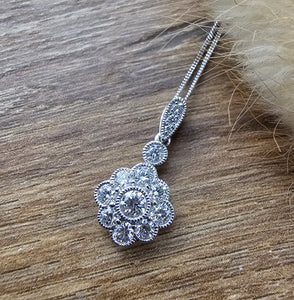 Vintage style diamond cluster pendant