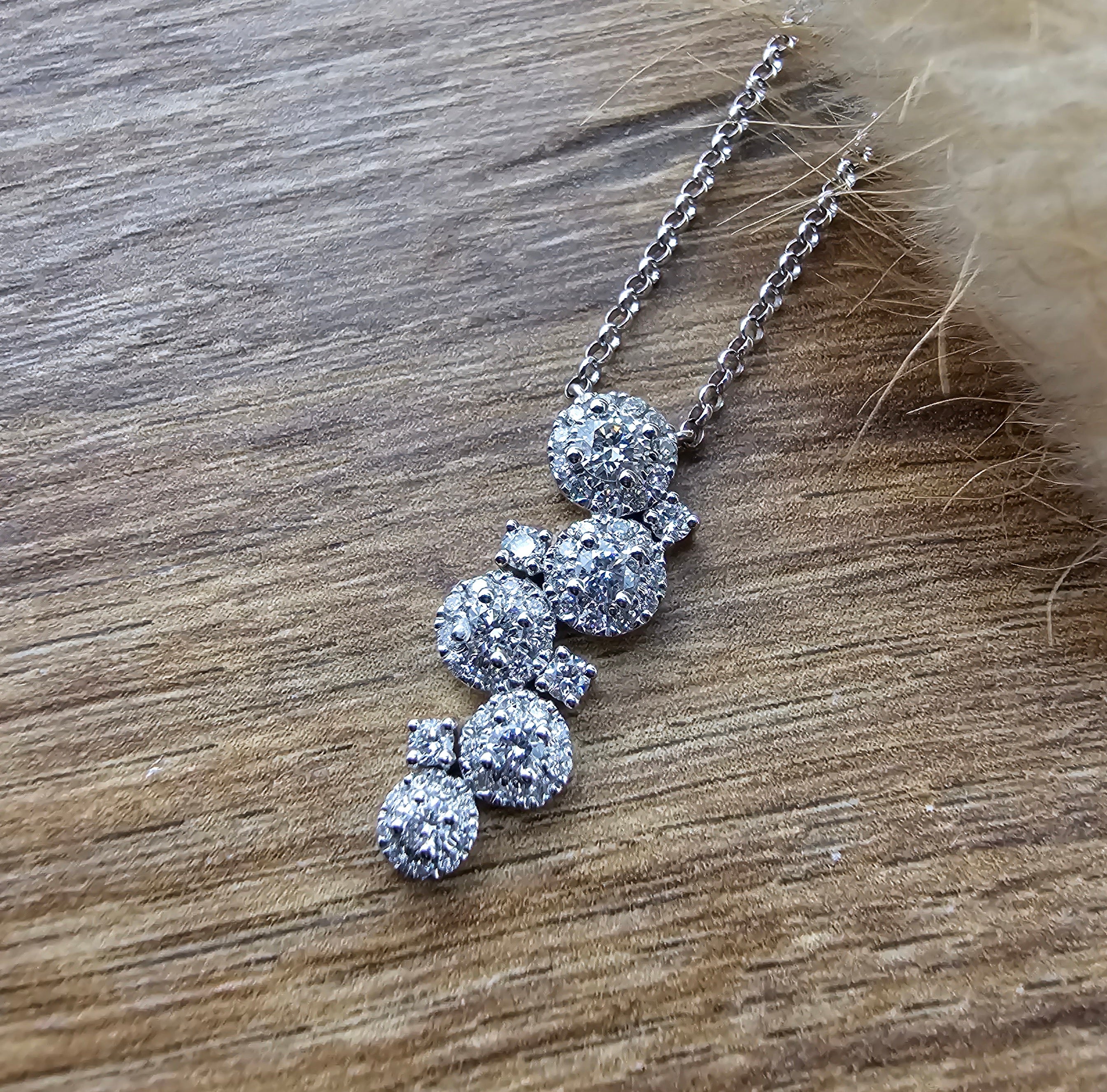 Diamond cascading cluster pendant