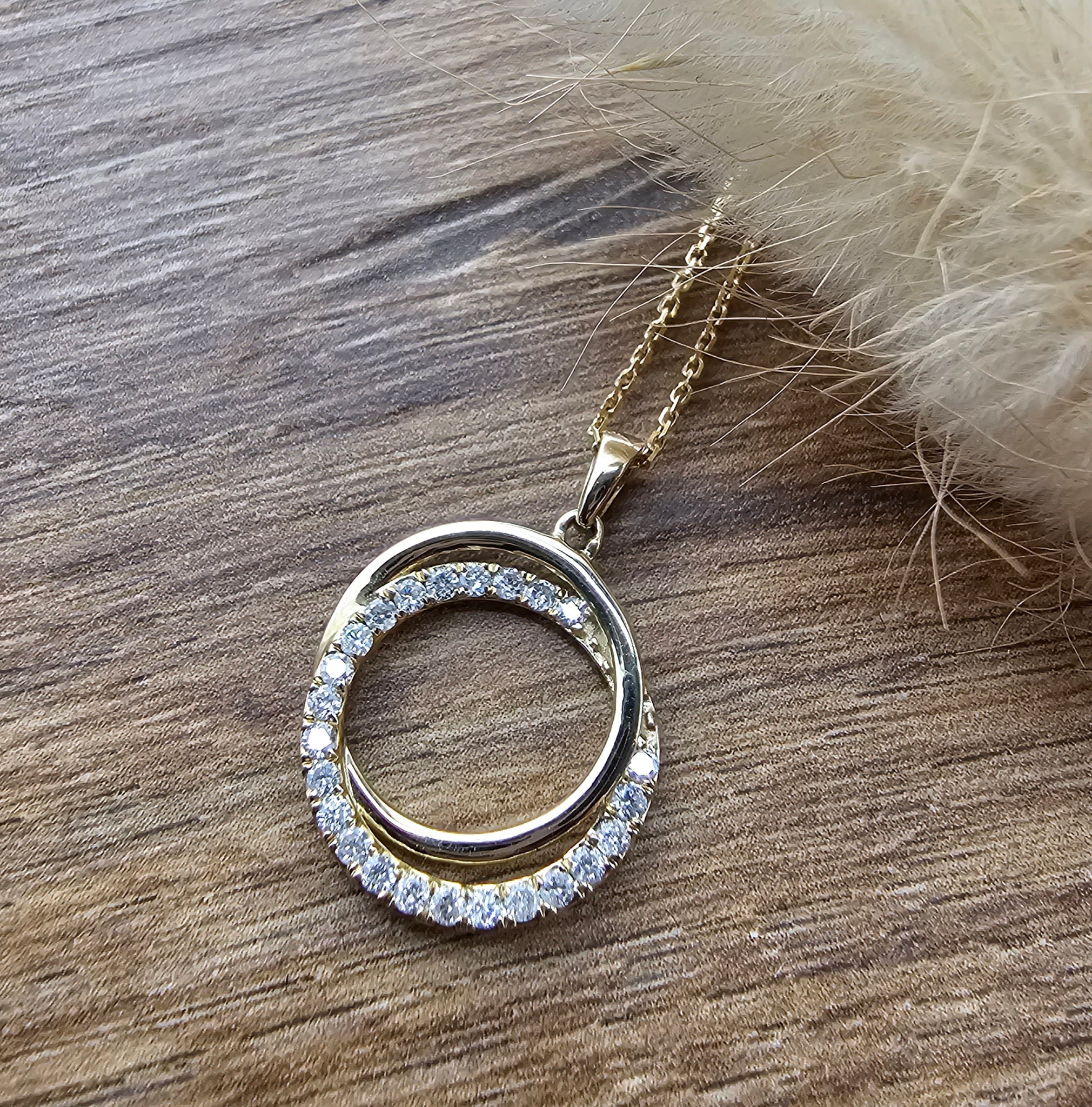 Gold swirl diamond pendant