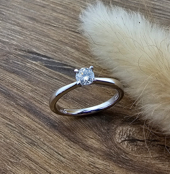 Diamond V claw set engagement ring