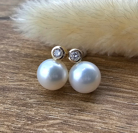 Pearl and diamond stud earrings