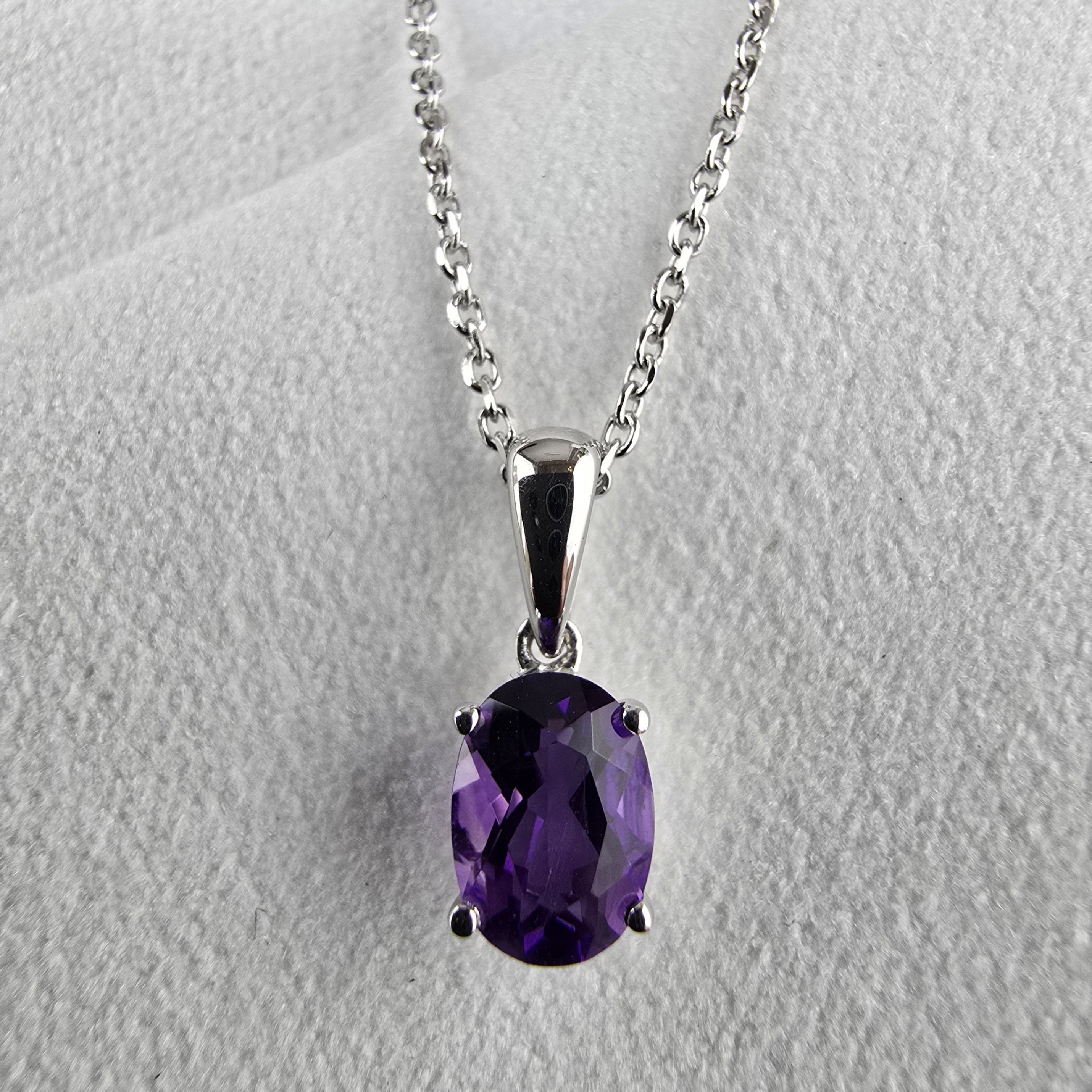 Oval Claw Set Amethyst Pendant