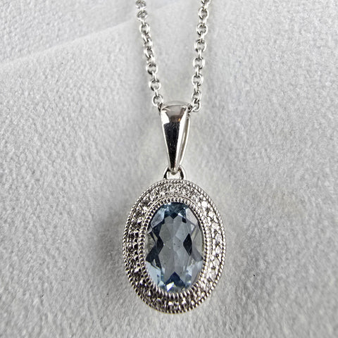 Aquamarine halo pendant