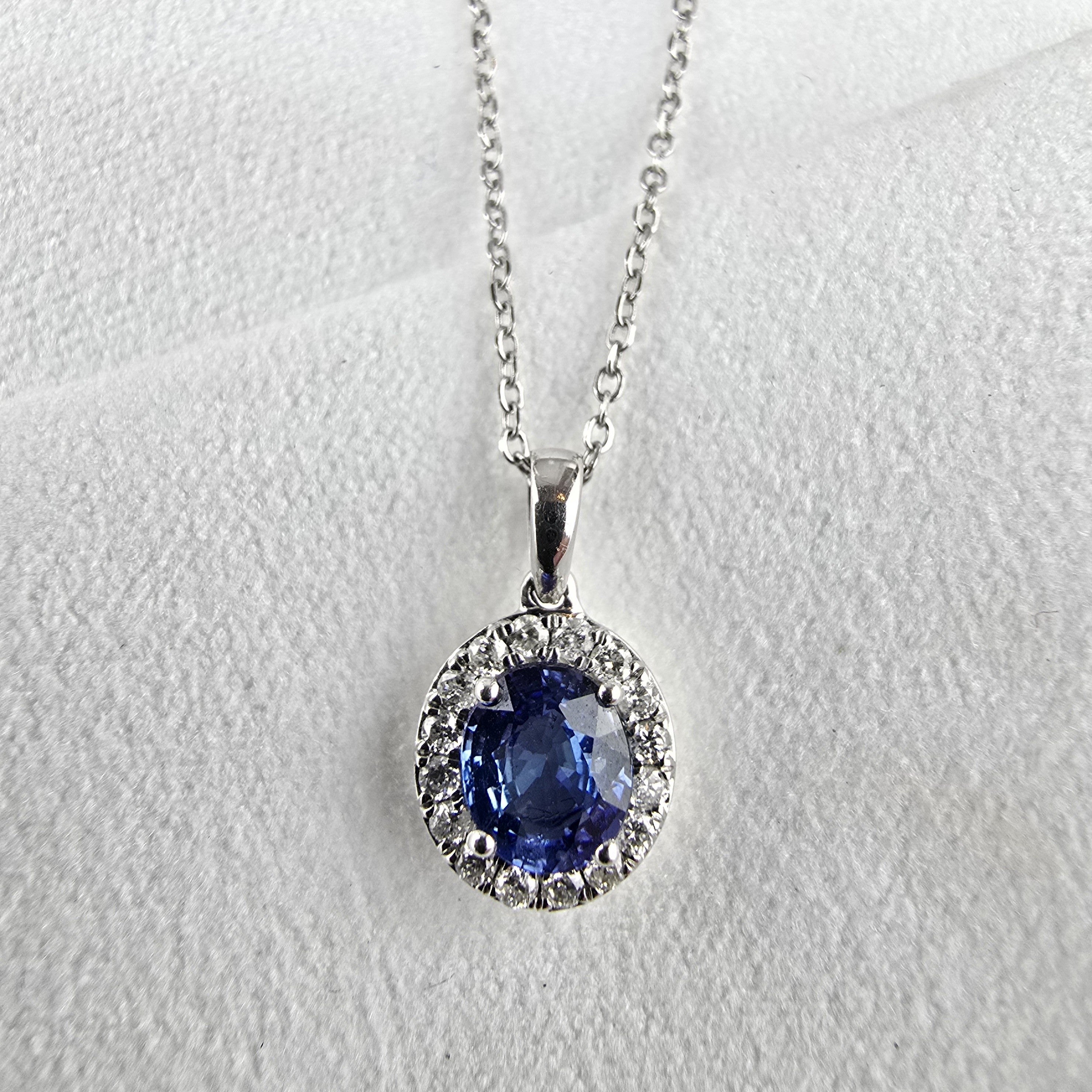 Sapphire and diamond halo pendant