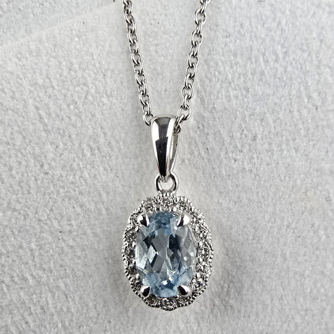 Vintage aquamarine halo pendant