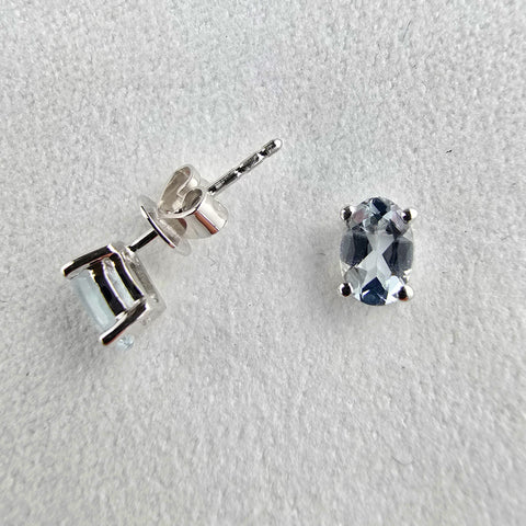 Oval Claw set aquamarine earrings