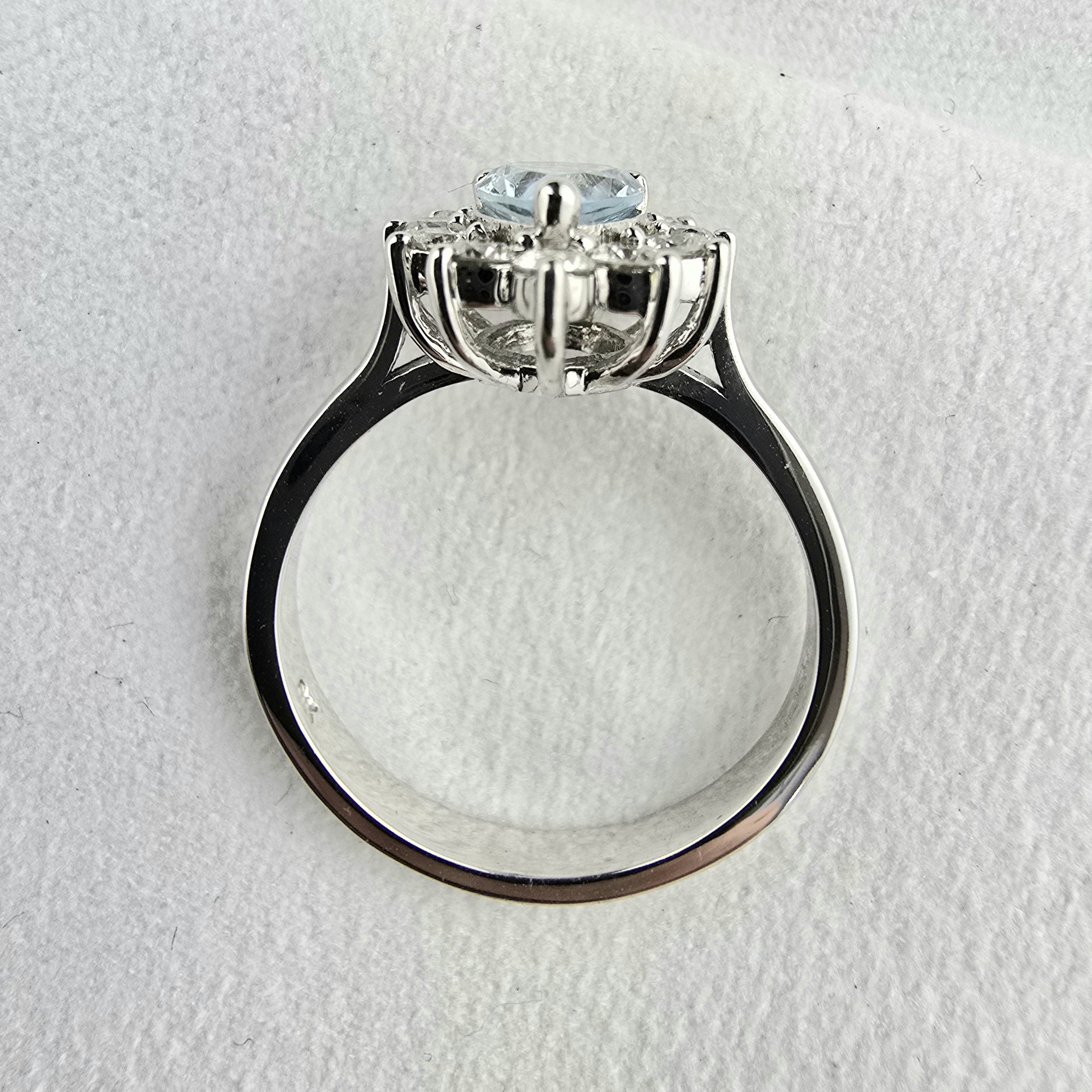 Pear shaped aquamarine cluster ring