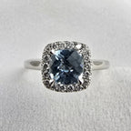 Cushion cut aquamarine halo ring