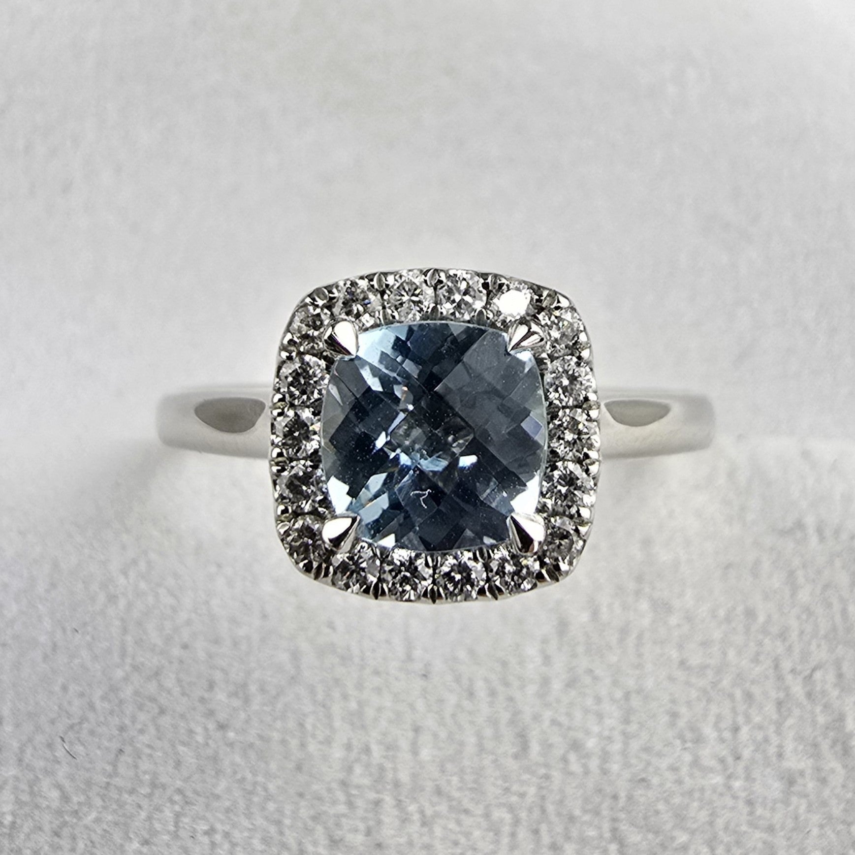 Cushion cut aquamarine halo ring