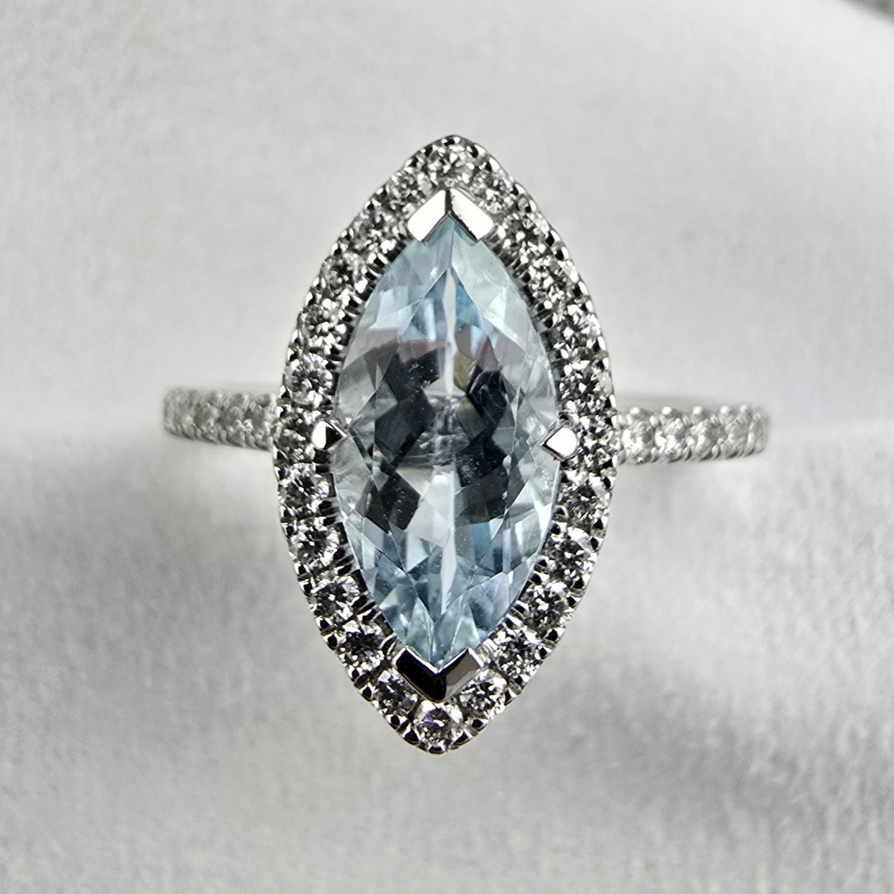 Aquamarine marquise cut halo ring