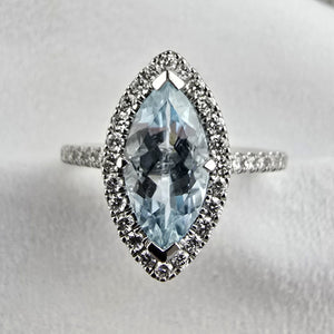 Aquamarine marquise cut halo ring