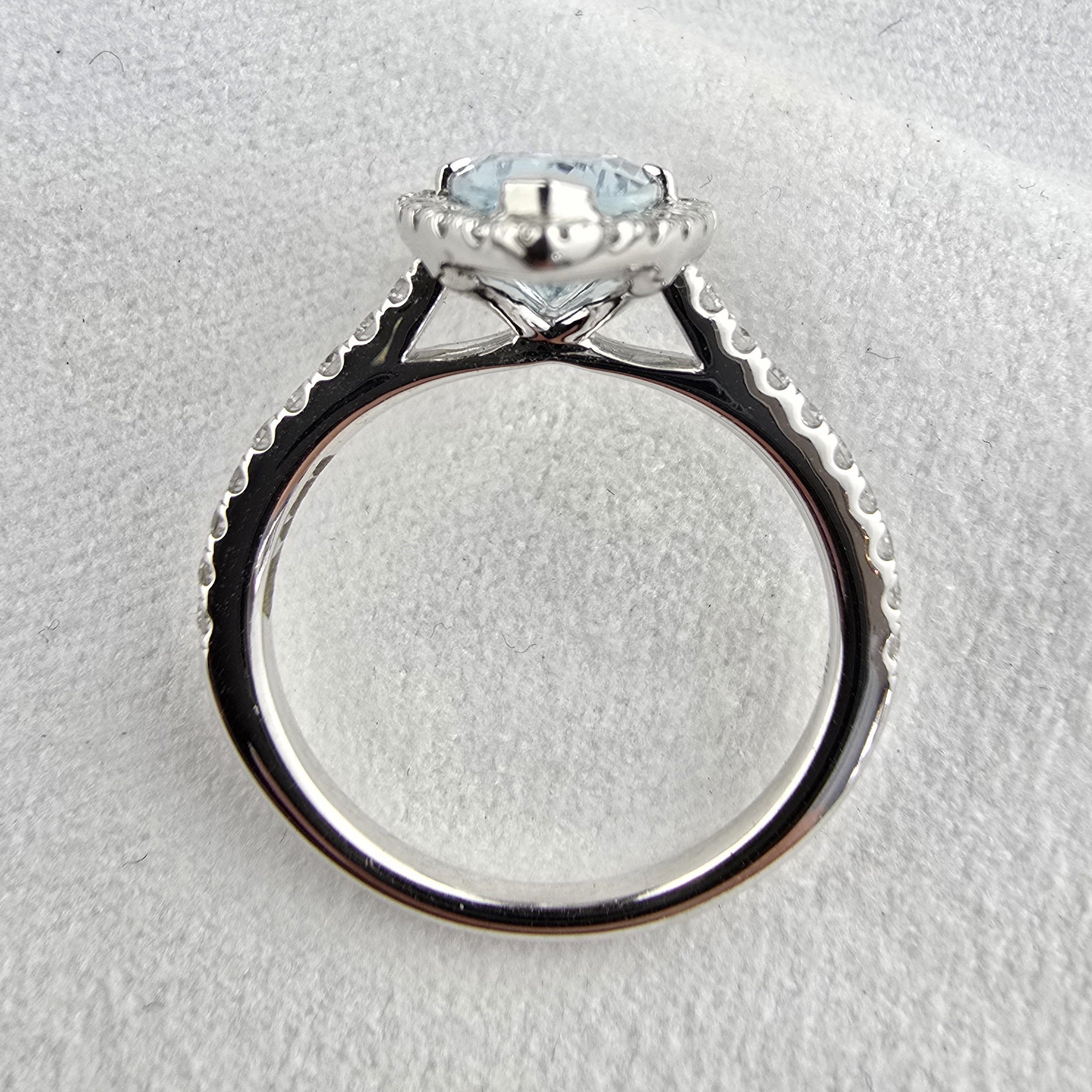 Aquamarine marquise cut halo ring
