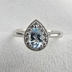 Pear shaped halo aquamarine ring