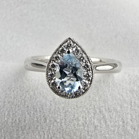 Pear shaped halo aquamarine ring