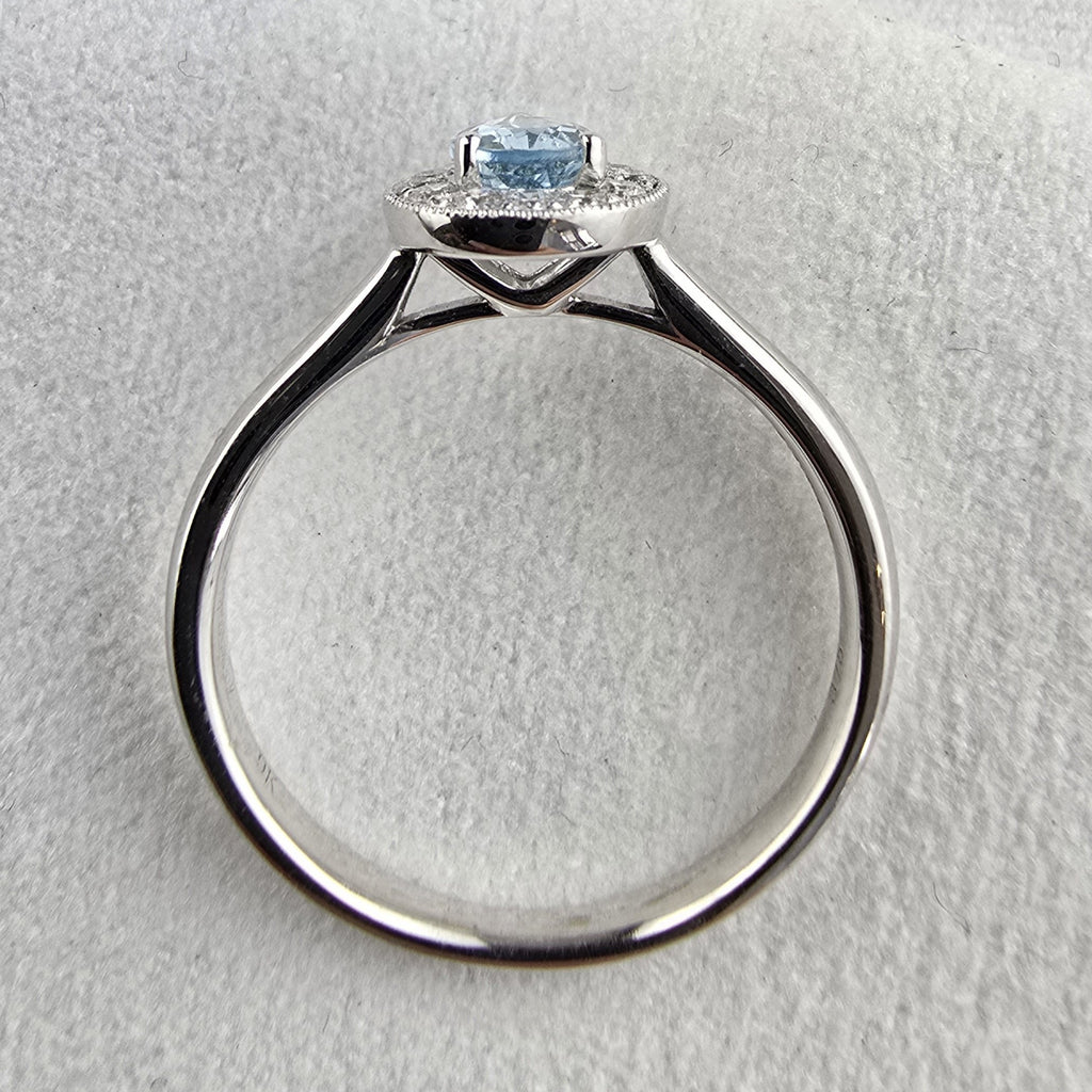 Pear shaped halo aquamarine ring