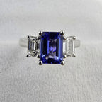 Octagonal cut tanzanite and diamond three stone ring