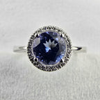 Round tanzanite halo ring