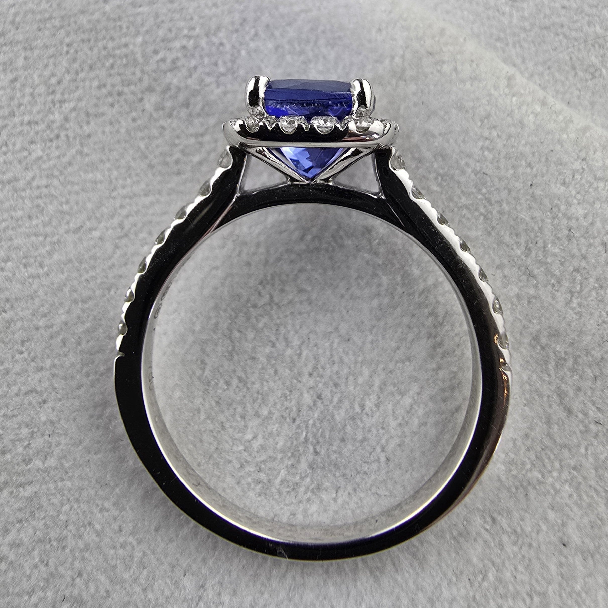 Round tanzanite halo ring