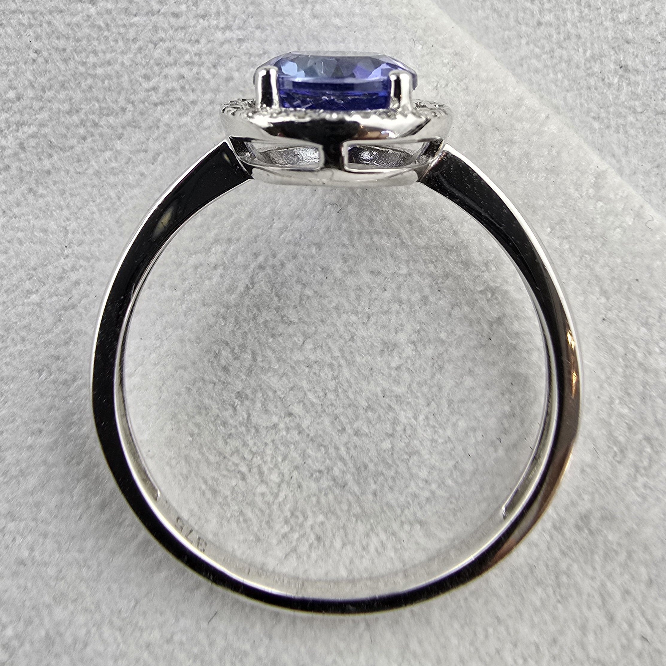 Cushion tanzanite halo ring