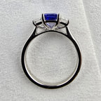 Octagonal cut tanzanite and diamond three stone ring